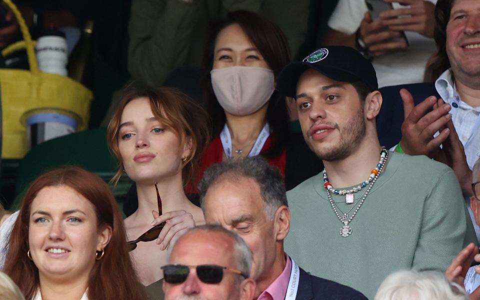 Phoebe Dynevor and Pete Davidson watching Roger Federer v Cameron Norrie in the third round. Wimbledon Day Six - Paul Marriott / Alamy Stock Photo