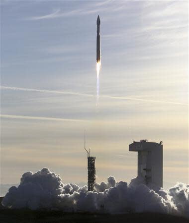 An Atlas 5 ULA (United Launch Alliance) rocket carrying a satellite for the Defense Meteorological Satellite Program is launched from Vandenberg Air Force Base in California April 3, 2014. REUTERS/Gene Blevins