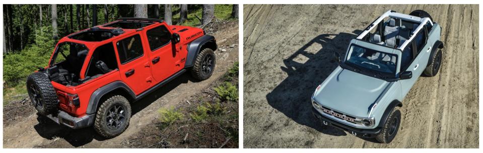 The Jeep Wrangler Rubicon Unlimited with its mid-mounted crossbar next to the new Ford Bronco with its rear-mounted crossbar.