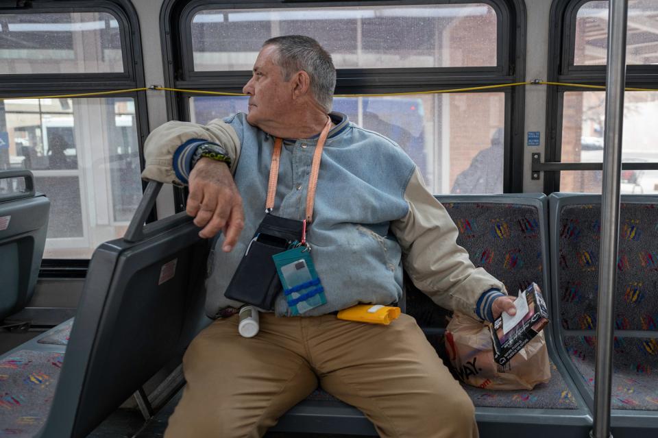 Tyler Fuqua waits to depart after a bus ride to the Pueblo Transit Center on Thursday, March 16, 2023.