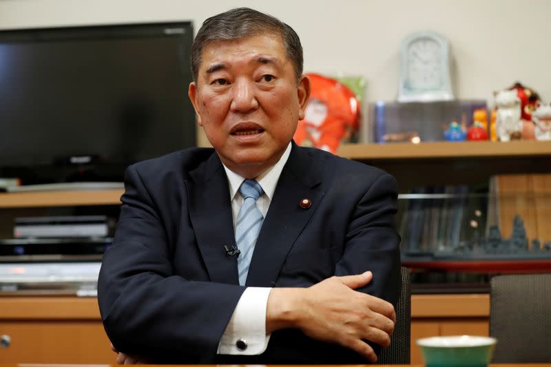 Japan's ruling Liberal Democratic Party lawmaker Shigeru Ishiba speaks during an interview with Reuters at his office in Tokyo