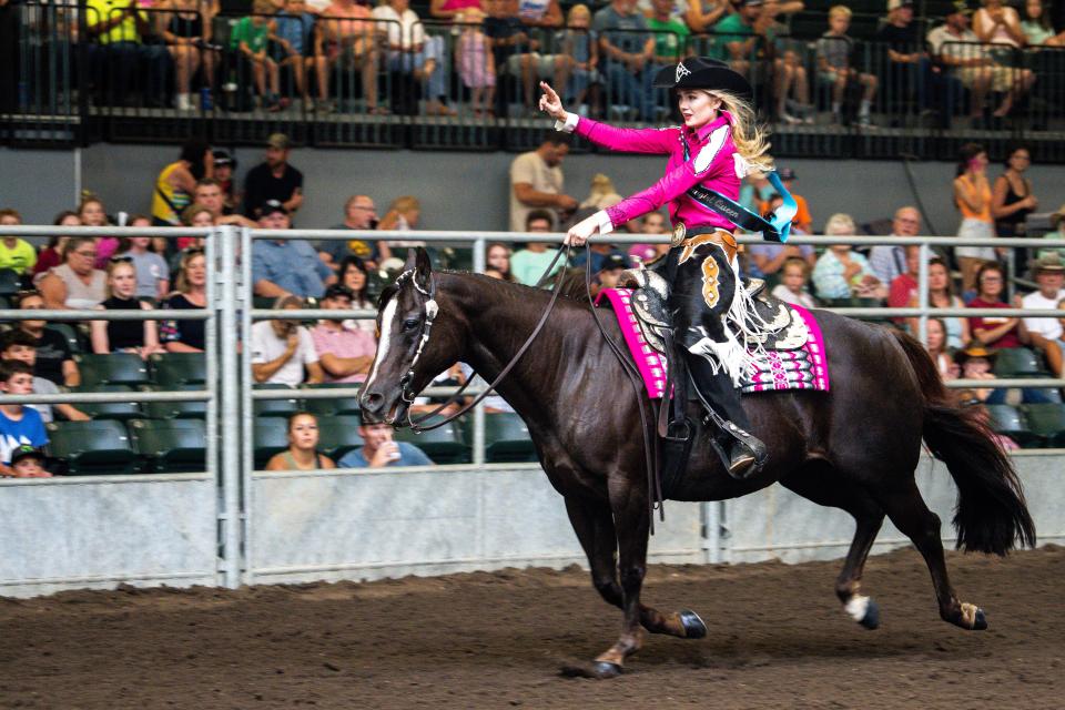 2022 Junior Cowgirl Queen Elivia Papcun rides her horse, Chicken, during the 2023 Junior Cowgirl Queen Contest at the Iowa State Fair on Friday, Aug. 11, 2023, in Des Moines.