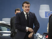 French President Emmanuel Macron arrives for an EU summit at the European Council building in Brussels, Friday, Feb. 21, 2020. In a second day of meetings EU leaders will continue to discuss the bloc's budget to work out Europe's spending plans for the next seven years. (Ludovic Marin, Pool Photo via AP)