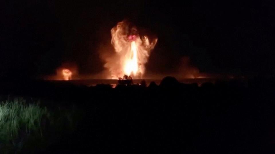 A mushroom cloud rises after an explosion in Toropets, seen in this screenshot from a social media video posted on September 18.