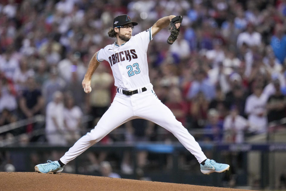 Arizona Diamondbacks starting pitcher Zac Gallen throws against the Philadelphia Phillies during the first inning in Game 5 of the baseball NL Championship Series in Phoenix, Saturday, Oct. 21, 2023. (AP Photo/Ross D. Franklin)