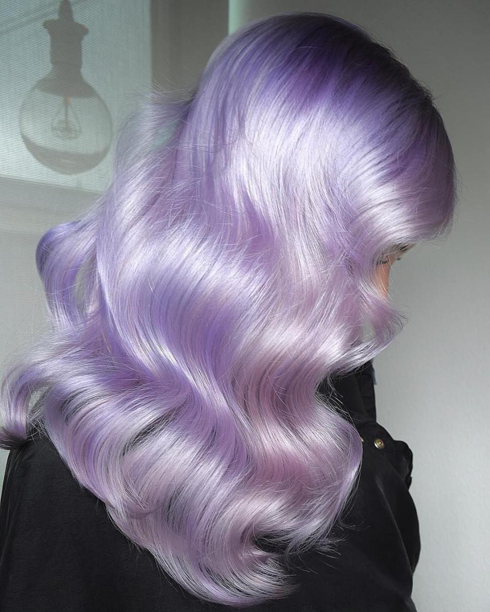 <p>While rose gold had a major moment last year, trend forecasters think the new "it girl" hair color is lilac. The pastel purple shade, like this one from stylists Melody and Michael Lowenstein at <a href="https://www.instagram.com/p/BpVV9pxFNrB/" rel="nofollow noopener" target="_blank" data-ylk="slk:Ross Michaels Salon;elm:context_link;itc:0;sec:content-canvas" class="link ">Ross Michaels Salon</a>, is what they call "when vintage meets modern."</p>