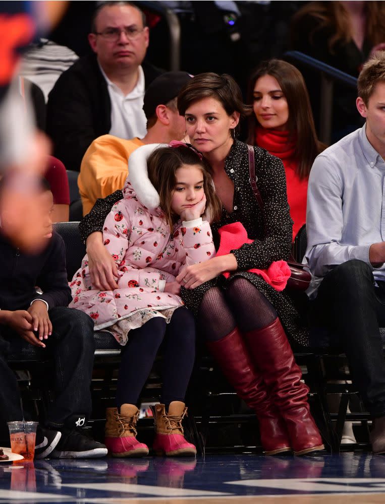 Suri Cruise (left) and Katie Holmes