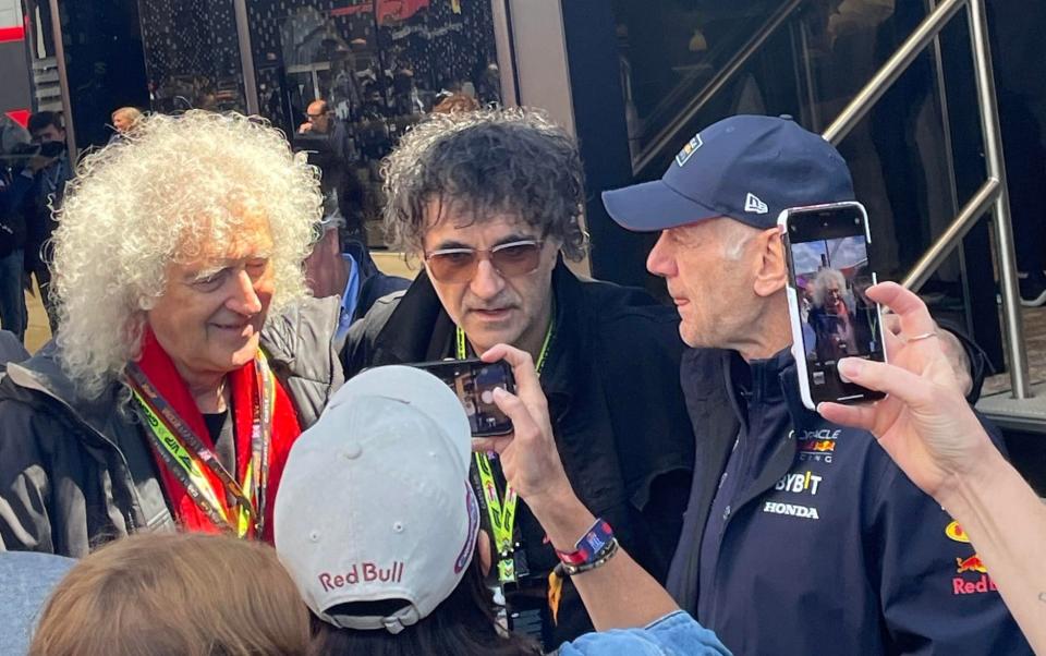 Brian May and Adrian Newey in the paddock