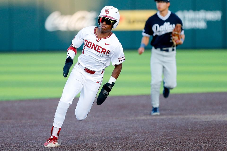 Oklahoma utility Jason Walk (1) rounds second during an NCAA baseball game between Oklahoma (OU) and Dallas Baptist (DBU) in Norman, Okla., on Tuesday, March 19, 2024.