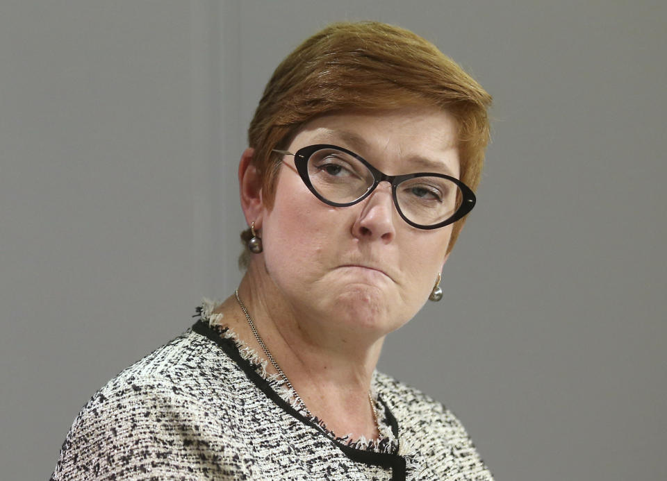 In this March 27, 2019, file photo Australia's foreign minister Marise Payne attends a press conference in Sydney. Payne, on Monday, Dec. 2, 2019, described as unacceptable the daily interrogation of a shackled Chinese Australian writer detained in Beijing on suspicion of espionage since January. (AP Photo/Rick Rycroft, File)