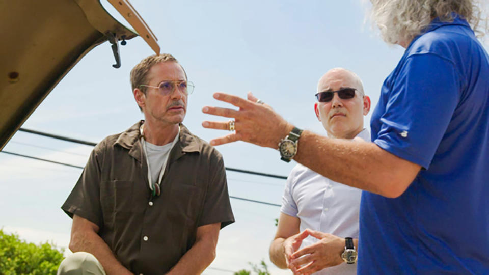 From left: Robert Downey Jr., Chis Mazzilli, and Charles Burnett discuss a restoration.