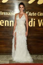 <p>Penelope proved her sartorial prowess in a feathery sequinned gown by Atelier Versace.<br><i>[Photo: Getty]</i> </p>