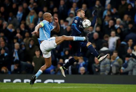 Football Soccer - Manchester City v Real Madrid - UEFA Champions League Semi Final First Leg - Etihad Stadium, Manchester, England - 26/4/16 Manchester City's Vincent Kompany in action with Real Madrid's Jese Reuters / Phil Noble Livepic