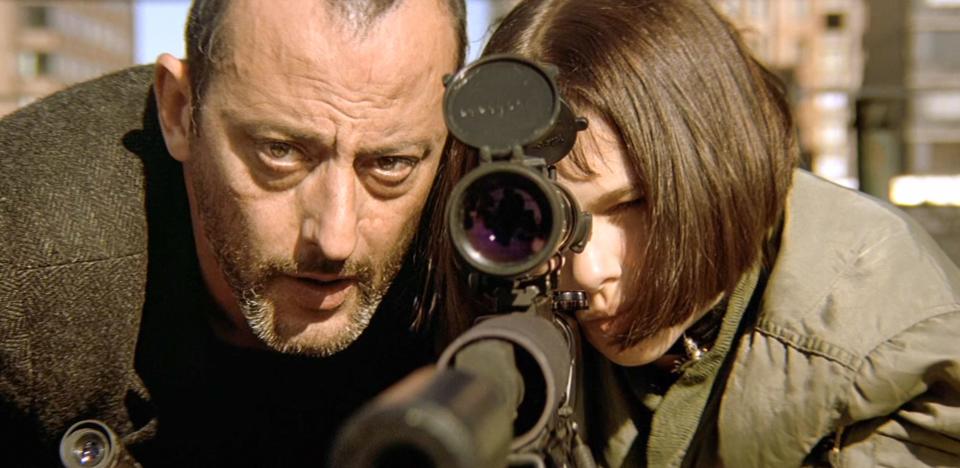 Natalie Portman and Jean Reno  in a scene from the (C)Gaumont Buena Vista movie: Leon (1994).  Plot: 12-year-old Mathilda is reluctantly taken in by Léon, a professional assassin, after her family is murdered. An unusual relationship forms as she becomes his protégée and learns the assassin's trade.  Ref: LMK110-J8893-310323 Supplied by LMKMEDIA. Editorial Only. Landmark Media is not the copyright owner of these Film or TV stills but provides a service only for recognised Media outlets. pictures@lmkmedia.com