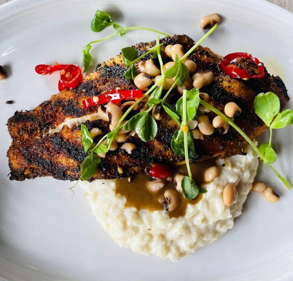 Leah & Louise’s Mud Island has blackened catfish, smoked catfish stew, rice grits, pickled field pea and candied pepper.