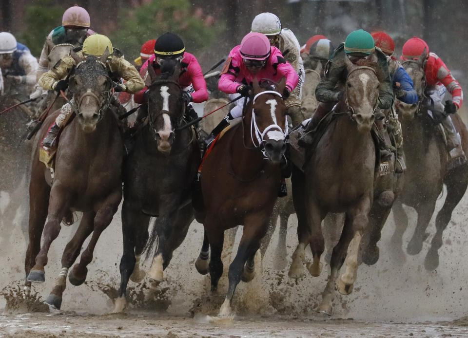 FILE - In this May 4, 2019, file photo, front row from left: Flavien Prat on Country House, Tyler Gaffalione on War of Will, Luis Saez on Maximum Security and John Velazquez on Code of Honor compete in the 145th running of the Kentucky Derby horse race at Churchill Downs in Louisville, Ky. (AP Photo/John Minchillo, File)