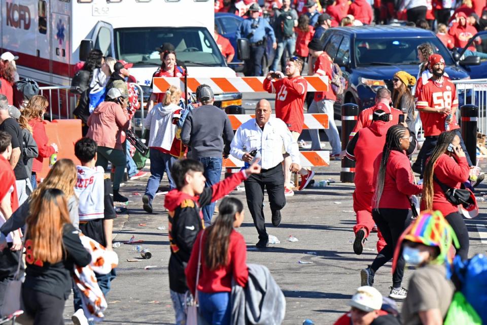 Panicked fans ran as law enforcement officers swarmed the area (USA TODAY Sports via Reuters Con)