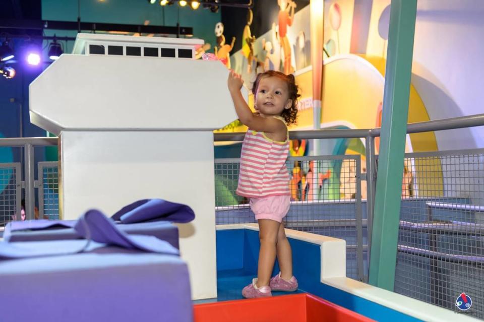 A child plays at the Carnival Cruise Upper Deck Exhibit at the Miami Children’s Museum.