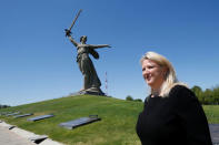 Deputy British Ambassador to Russia Lindsay Skoll stands in front of "The Motherland Calls" monument at the Mamayev Kurgan World War Two memorial complex in Volgograd, Russia June 18, 2018. REUTERS/Gleb Garanich