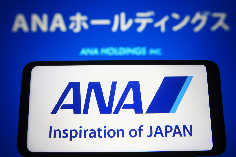 UKRAINE - 2021/10/29: In this photo illustration, the All Nippon Airways (ANA holdings) logo is shown on a smartphone and PC screen.  (Photo illustration by Pavlo Gonchar/SOPA Images/LightRocket via Getty Images)