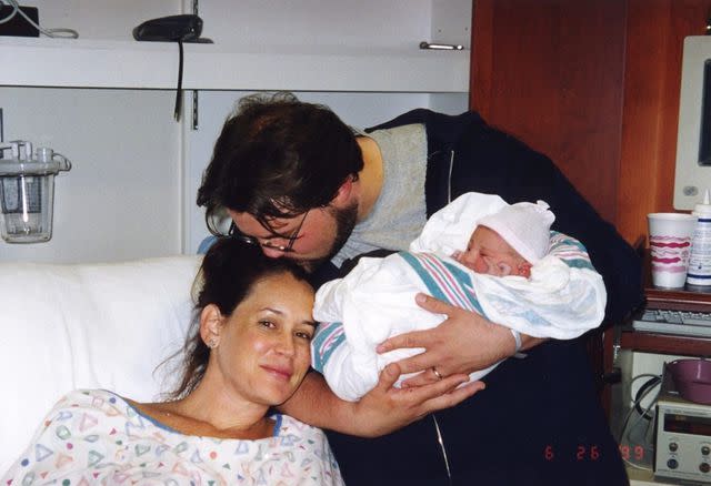 <p>Kevin Smith Instagram</p> Kevin Smith and Jennifer Schwalbach Smith with their newborn baby in 1999.