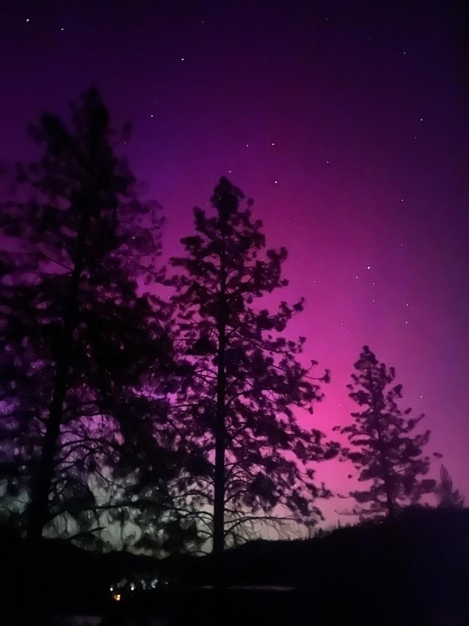 The northern lights are seen about 11:30 p.m. on Friday, May 10, 2024 at Whiskeytown Lake near Redding, California.