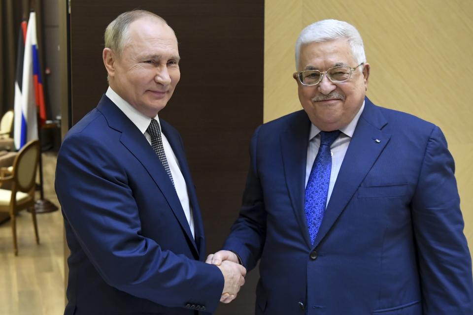 FILE - Russian President Vladimir Putin, left, and Palestinian President Mahmoud Abbas pose for a photo prior to their talks in the Bocharov Ruchei residence in the Black Sea resort of Sochi, Russia, on Nov. 23, 2021. Moscow has maintained close ties with the Palestinians and repeatedly hosted Palestinian leader Mahmoud Abbas. (Yevgeny Biyatov, Sputnik, Kremlin Pool Photo via AP, File)