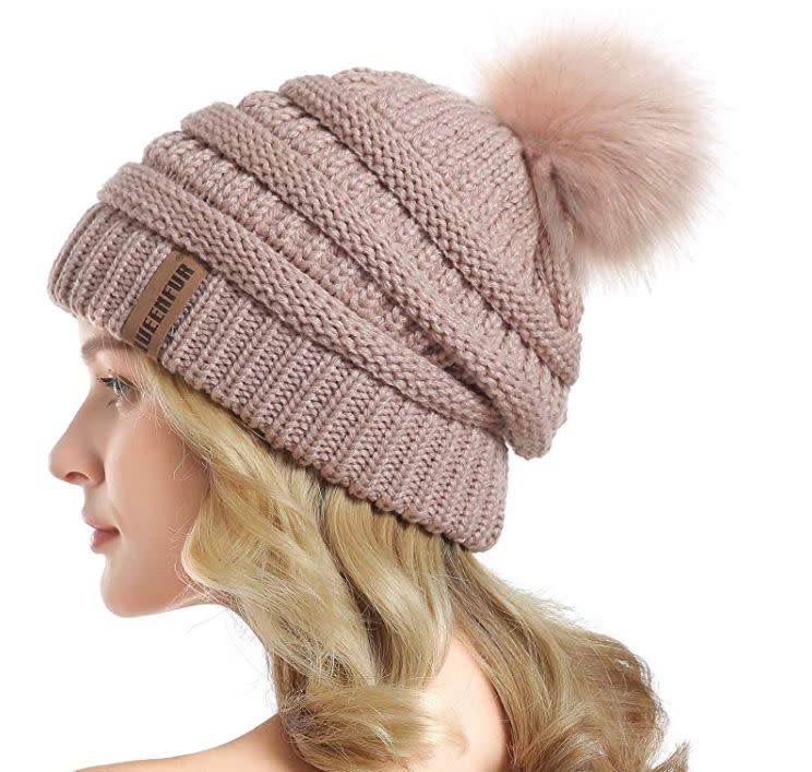 This cable knit hat comes in tons of color combinations. Find it for $11 on <strong><a href="https://amzn.to/2W82VcO" target="_blank" rel="noopener noreferrer">Amazon</a></strong>.