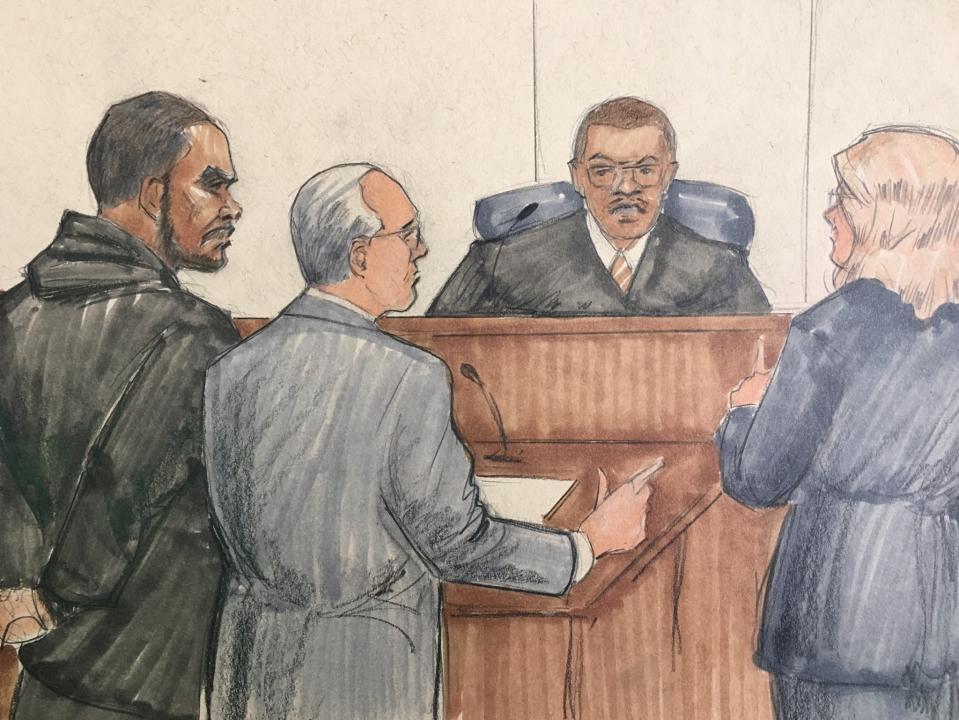 ADDS NAMES OF LAWYERS - In this courtroom sketch, R&B singer R. Kelly, attorney Steve Greenberg and prosecutor Jennifer Gonzalez appears before Cook County Judge John Fitzgerald Lyke Jr. at the Leighton Criminal Courthouse, Saturday, Feb. 23, 2019 in Chicago. The judge has set Kelly’s bond at $1 million saying that the amount equals $250,000 for each of the four people he’s charged with sexually abusing. (AP Photo/Tom Gianni)