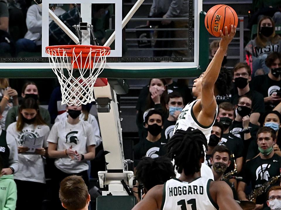 Dec 4, 2021; East Lansing, Michigan, USA;  Michigan State Spartans guard Jaden Akins (3) shoots in the first half at Jack Breslin Student Events Center.