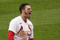 St. Louis Cardinals' Nolan Arenado celebrates after hitting a two-run home run during the eighth inning of a baseball game against the Milwaukee Brewers Thursday, April 8, 2021, in St. Louis. (AP Photo/Jeff Roberson)