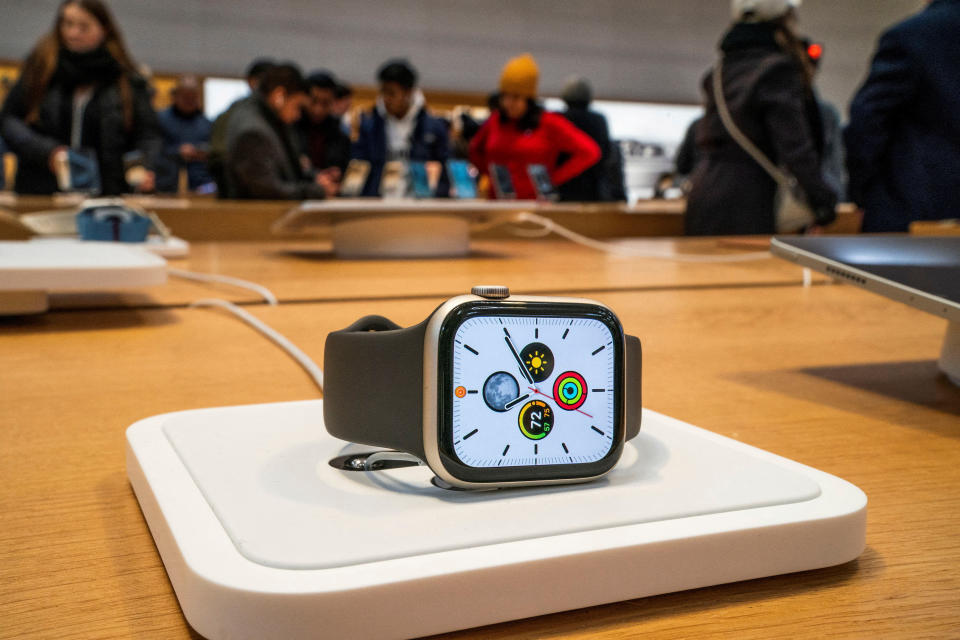 FILE PHOTO: An Apple smartwatch is displayed as customers visit the Apple store in New York, U.S., December 26, 2023. REUTERS/Eduardo Munoz/File Photo