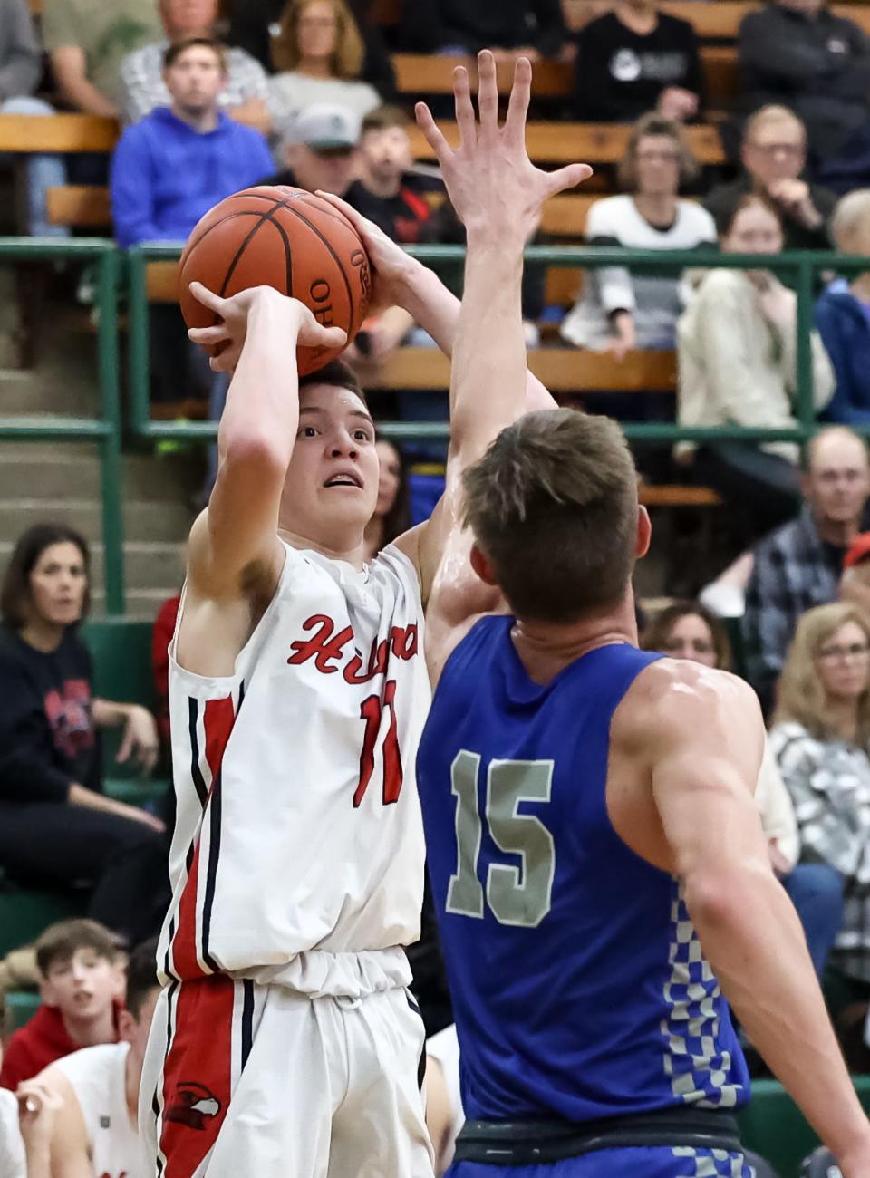 Hiland's Samuel Detweiler fires up this second half 3-pointer over Bishop Ready's Tony Whitt.