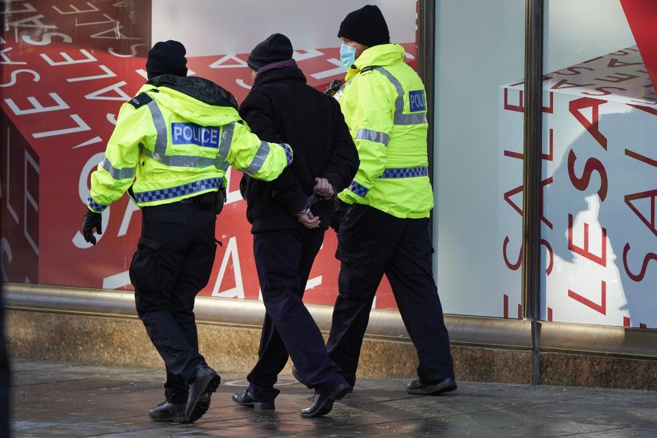 An anti-lockdown protester is detained in Newcastle city centre. Priti Patel has praised the ‘selflessness’ of officers policing through the pandemic (Getty Images)