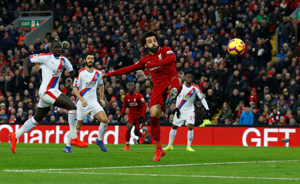 Mohamed Salah (center) scored twice to help Liverpool avoid misery against Crystal Palace. (Reuters)