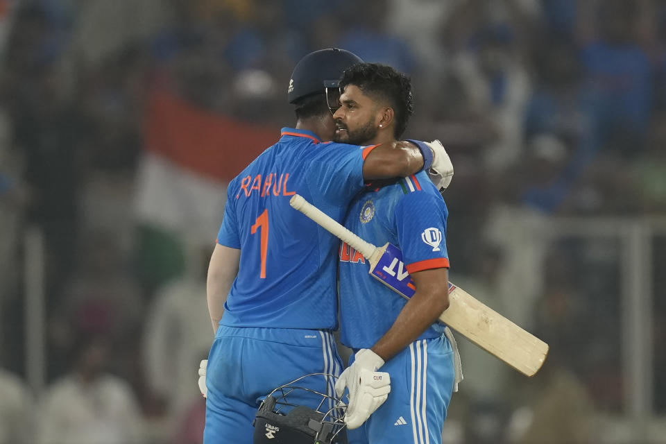 India's Shreyas Iyer, right, and India's KL Rahul celebrate their win in the ICC Men's Cricket World Cup match between India and Pakistan in Ahmedabad, India, Saturday, Oct. 14, 2023.(AP Photo/Rajanish Kakade)