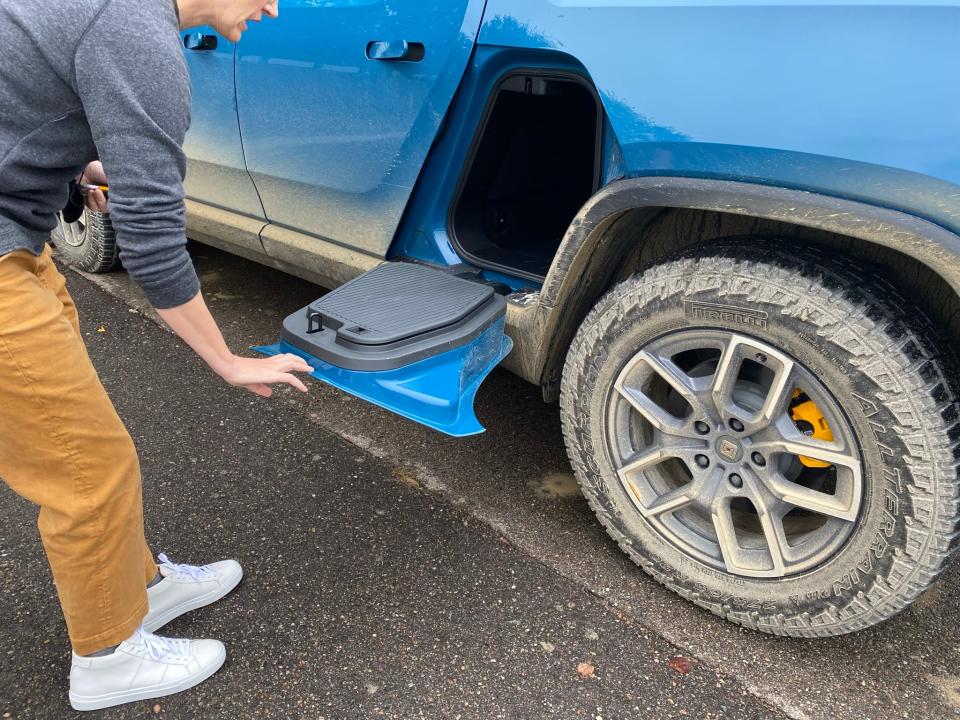 The Rivian R1T has a storage compartment between the cab and bed.