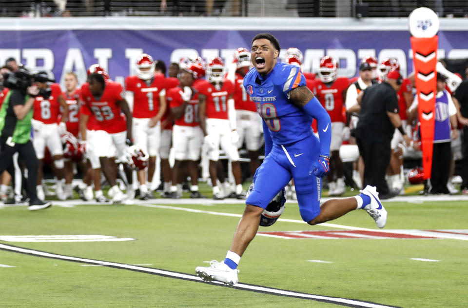Boise State wide receiver Billy Bowens (18) celebrates after the Mountain West championship NCAA college football game against UNLV Saturday, Dec. 2, 2023, in Las Vegas. (Steve Marcus/Las Vegas Sun via AP)