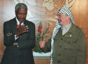 FILE - In this file photo dated Wednesday, March 5, 1997, United Nations Secretary-General Kofi Annan, left, talks with Palestinian leader Yasser Arafat during a meeting in Annan's U.N. office, as Arafat sought support for his stand against a planned Jewish settlement in east Jerusalem. Kofi Annan, one of the world's most celebrated diplomats and a charismatic symbol of the United Nations who rose through its ranks to become the first black African secretary-general, has died aged 80, according to an announcement by his foundation Saturday Aug. 18, 2018. (AP Photo/Richard Drew, FILE)