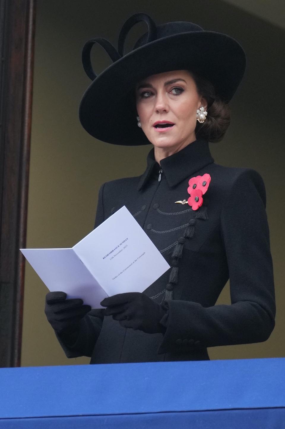 Kate Middleton, heels, high heels, hidden heels, black coat, embroidered coat, hat, pin, brooch, Remembrance Day, National Service of Remembrance, London, United Kingdom, Queen Camilla, royals, royal style, royal family