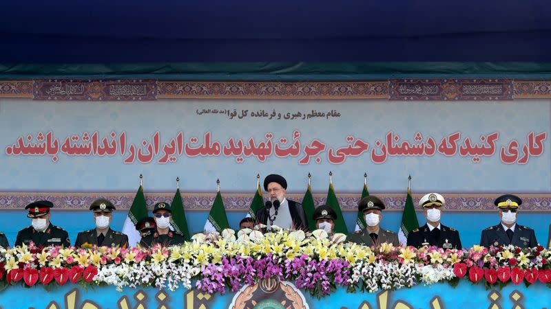 Iranian President Ebrahim Raisi delivers a speech during the ceremony of the National Army Day parade in Tehran