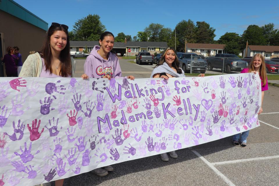 Some Ben R. McMullin alumni dropped by their old elementary school Friday to take part in a community walk to honour the memory of former teacher Jennifer Kelly, who passed away in February following a lengthy battle with cancer.