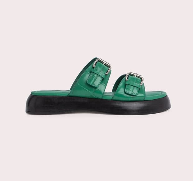 <p>By Far Wyatt Clover Green Maxi Croco and Nappa Leather Sandal, $460, <a href="https://www.byfar.com/products/wyatt-clover-green-maxi-croco-and-nappa-leather?" rel="nofollow noopener" target="_blank" data-ylk="slk:available here;elm:context_link;itc:0;sec:content-canvas" class="link ">available here</a></p>