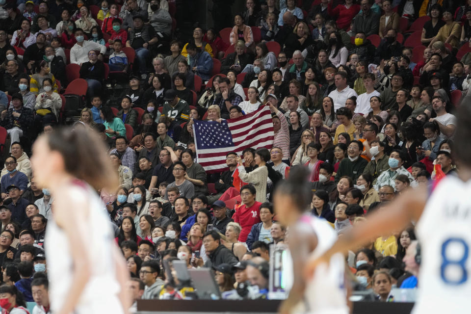 Spectators react during the United States versus China game at the women's Basketball World Cup in Sydney, Australia, Saturday, Sept. 24, 2022. (AP Photo/Mark Baker)