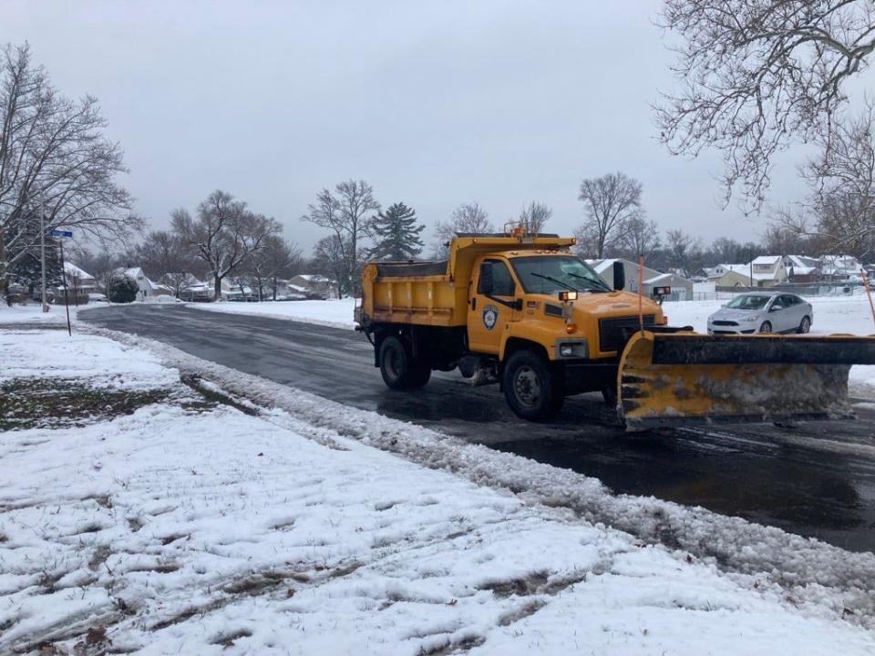 A Bristol Township snow plow rolls on Appletree Drive after a storm that dropped about three inches on Lower Bucks County.