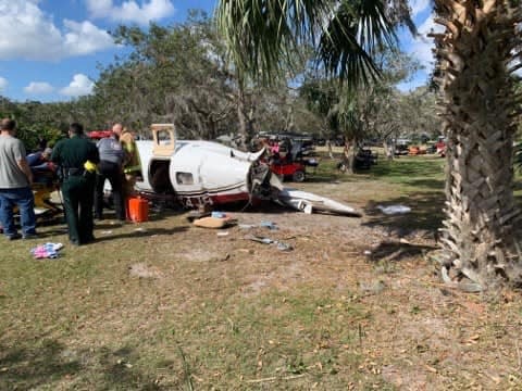 Two people escaped serious injuries on Thursday when this Piper Malibu plane crashed into a tree while taking off at the Spruce Creek Fly-In in Port Orange.