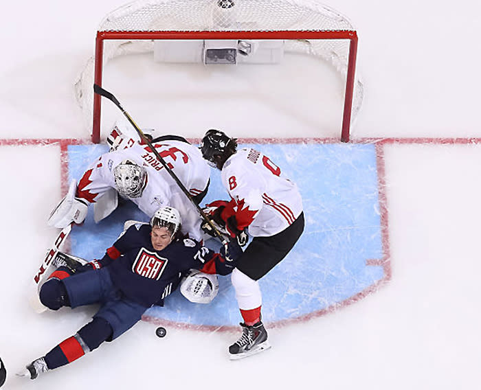 TORONTO, ON - SEPTEMBER 20: Carey Price #31 and Drew Doughty #8 of Team Canada defend their net against T.J. Oshie #74 of Team USA during the World Cup of Hockey game at Air Canada Centre on September 20, 2016 in Toronto, Ontario, Canada. (Photo by Andre Ringuette/World Cup of Hockey via Getty Images)