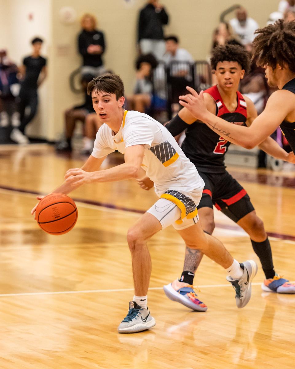 Stony Point's Hudson Johnson, left, drives for the Austin team. The San Antonio area All-Stars defeated the Austin area All-Stars 130-118 at the Jordan Clarkson All Star Weekend seniors game on Saturday at Round Rock High School.