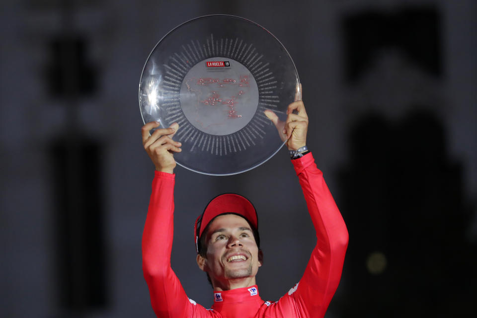 Primoz Roglic of Slovenia celebrates on the podium after winning La Vuelta cycling race in Madrid, Spain, Sunday, Sept. 15, 2019. (AP Photo/Manu Fernandez)