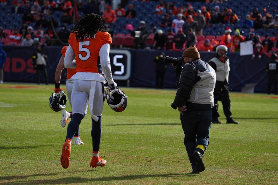 Broncos linebacker Randy Gregory walks off the field after a Week 15 game against the Cardinals.